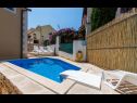 Апартаменты Dalis - open swimming pool: A1 kat(4+1), A2 prizemlje(4) Залив Осибова (Милна) - Остров Брач  - Хорватия - бассейн