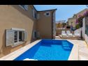 Апартаменты Dalis - open swimming pool: A1 kat(4+1), A2 prizemlje(4) Залив Осибова (Милна) - Остров Брач  - Хорватия - дом
