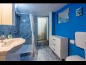 Апартаменты Mila - in blue: A1(4+2), A2(5+1), A3(4+2) Банйоле - Истра  - Апартамент - A1(4+2): ванная комната с туалетом