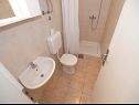 Апартаменты Srzi - 200 m from sea: A1(7+1), SA2(2), A3(2+1) Макарска - Ривьера Макарска  - Апартамент - A1(7+1): ванная комната с туалетом