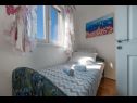 Апартаменты Duki - sea view: A1(4+1), A2(3+2) Макарска - Ривьера Макарска  - Апартамент - A2(3+2): спальная комната