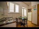 Апартаменты Saga - with swimming pool A2(2+1), A3(6+1) Локва Рогозница - Ривьера Омиш  - Апартамент - A2(2+1): кухня и столовая