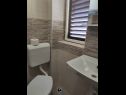 Апартаменты Mare - great location: A2(4), A3(3), A4(3) Новалья - Остров Паг  - Апартамент - A2(4): ванная комната с туалетом