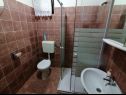 Апартаменты Draga - free parking & BBQ: A1(4), A2(4+2) Паг - Остров Паг  - Апартамент - A1(4): ванная комната с туалетом
