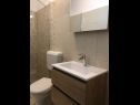 Апартаменты и комнаты  Mila - yard: A1(4+1), R1(2+1), R2(2) Супетарска Драга - Остров Раб  - Апартамент - A1(4+1): ванная комната с туалетом