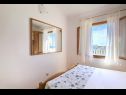 Апартаменты Branka - 30 m from beach: A1 zeleni(4+1), A2 žuti(4+1) Залив Каница (Рогозница) - Шибеник Ривьера  - Хорватия - Апартамент - A2 žuti(4+1): спальная комната