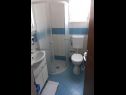Апартаменты Amalija - 50m close to the sea: A2(2), A3 posebni(2), A4(4) Рогозница - Шибеник Ривьера  - Апартамент - A4(4): ванная комната с туалетом