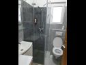 Апартаменты Mari - peaceful and quiet location: A1(4+2), A2(2+3) Стоморска - Остров Шолта  - Апартамент - A1(4+2): ванная комната с туалетом