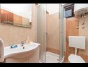Апартаменты Vin - 40 m from sea: A1 (4+1), A2 (2+2), A3 (2+2) Сегет Доньи - Ривьера Трогир  - Апартамент - A2 (2+2): ванная комната с туалетом