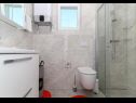 Апартаменты Iva - great view: A1(4) Сегет Доньи - Ривьера Трогир  - Апартамент - A1(4): ванная комната с туалетом