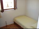 Апартаменты Tone - spacious and comfortable: A1 zuti(5+2), A2 plavi(5+2) Трогир - Ривьера Трогир  - Апартамент - A1 zuti(5+2): спальная комната