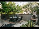 Апартаменты Florio - garden & free parking: A1(5) Трогир - Ривьера Трогир  - камин