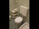 Апартаменты Slaven - 50 m from beach: A1(4+2), A2(2+1), A3(4+1) Винишче - Ривьера Трогир  - Апартамент - A1(4+2): ванная комната с туалетом