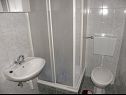 Апартаменты Zvone - 100 m from sea: A1(4+1), A2(4+1) Бибинье - Задар Ривьера  - Апартамент - A1(4+1): ванная комната с туалетом