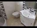Апартаменты Ivan C A1(4+1), A2(4+1), A4(4+1), A3(4+1) Бибинье - Задар Ривьера  - Апартамент - A1(4+1): ванная комната с туалетом