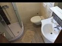 Апартаменты Ivan C A1(4+1), A2(4+1), A4(4+1), A3(4+1) Бибинье - Задар Ривьера  - Апартамент - A4(4+1): ванная комната с туалетом