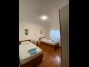Апартаменты Draga - comfortable & afordable: A1(2+2), A2(6), A3(2+2) Вир - Задар Ривьера  - Апартамент - A2(6): спальная комната