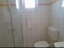 Апартаменты Vanja - terrace & BBQ A1(4+2), A2(4+1) Вир - Задар Ривьера  - Апартамент - A1(4+2): ванная комната с туалетом