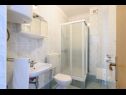Апартаменты Vese - 100 m from beach: A1(2+2), A2(2+2), A3(5+3), A4(2+2) Свети Петар - Ривьера Биоград  - Апартамент - A1(2+2): ванная комната с туалетом