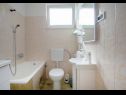 Апартаменты Damir - 80 m from beach: A1(4), A2(2+2) Постира - Остров Брач  - Апартамент - A1(4): ванная комната с туалетом
