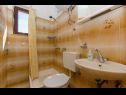 Апартаменты Gogi - 130 m from sea: SA2(2), A1(2) Постира - Остров Брач  - Апартамент - A1(2): ванная комната с туалетом