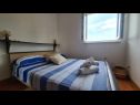 Апартаменты Marin - amazing sea view: A1(4+1), A2(4+1), A3(4+1) Сплитска - Остров Брач  - Апартамент - A2(4+1): спальная комната