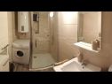 Апартаменты Neda - 80m from the sea: A1(5), A2(2) Сутиван - Остров Брач  - Апартамент - A1(5): ванная комната с туалетом