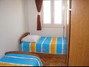 Апартаменты Joško - 70 m from beach: SA1(3), A2(6) Мастринка - Остров Чиово  - Апартамент - A2(6): спальная комната