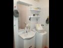 Апартаменты Dioniza - 150 m from beach: A1(2+2), A2(3), A3(2+2) Йелса - Остров Хвар  - Апартамент - A1(2+2): ванная комната с туалетом