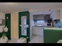 Апартаменты Vedro - 50 m from sea: 1- Red(4+1), 2 - Purple(2+1), 3 - Blue(2), 4 - Green(2+2) Корчула - Остров Корчула  - Апартамент - 4 - Green(2+2): кухня и столовая