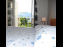 Апартаменты Krila - cozy and seaview : A1(2+2), A2(2+1), A3(4+1) Лумбарда - Остров Корчула  - Апартамент - A1(2+2): спальная комната