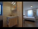 Апартаменты Insula Insule - rustic & peaceful: SA1(2+1), SA2(2+1) Скрбчићи - Остров Крк  - Студия- апартамент - SA1(2+1): ванная комната с туалетом