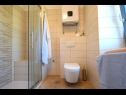 Апартаменты Insula Insule - rustic & peaceful: SA1(2+1), SA2(2+1) Скрбчићи - Остров Крк  - Студия- апартамент - SA2(2+1): ванная комната с туалетом