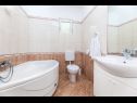 Апартаменты Juri A1(2+2), A2(2+2) Врбник - Остров Крк  - Апартамент - A1(2+2): ванная комната с туалетом