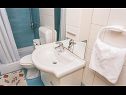 Апартаменты Brusic A1(2) Врбник - Остров Крк  - Апартамент - A1(2): ванная комната с туалетом
