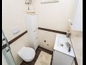 Апартаменты Zahija A1(2) Врбник - Остров Крк  - Апартамент - A1(2): ванная комната с туалетом