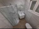 Апартаменты Željko - spacious and affordable A1(6+2), SA2(2), SA3(2), SA4(2+1) Макарска - Ривьера Макарска  - Апартамент - A1(6+2): ванная комната с туалетом