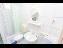 Апартаменты Tomislava - ground floor apartments: A1(2+1), A2(2+3) Макарска - Ривьера Макарска  - Апартамент - A2(2+3): ванная комната с туалетом