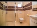 Апартаменты Saga 2 - with swimming pool A6(4+1), A7 (2+2), A8 (4+1) Локва Рогозница - Ривьера Омиш  - Апартамент - A8 (4+1): ванная комната с туалетом