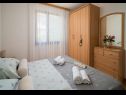 Апартаменты Divna - modern apartments with terrace : A1(2+2), A2(2+3), A4(8+1) Станичи - Ривьера Омиш  - Апартамент - A4(8+1): спальная комната