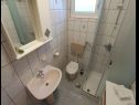 Апартаменты Miljenko - 100 m from the beach : A1(2+2), A2(4+1) Доброполяна - Остров Пашман  - Апартамент - A1(2+2): ванная комната с туалетом