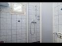 Апартаменты Krešo - 100 m from sea A1 desni(4), A2 lijevi(5), A3(2) Ткон - Остров Пашман  - Апартамент - A1 desni(4): ванная комната с туалетом