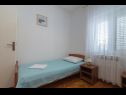 Апартаменты Krešo - 100 m from sea A1 desni(4), A2 lijevi(5), A3(2) Ткон - Остров Пашман  - Апартамент - A2 lijevi(5): спальная комната