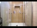 Апартаменты Spomenka - green paradise; A1(4+1), A2(4+1), A3(6) Палит - Остров Раб  - Апартамент - A3(6): ванная комната с туалетом