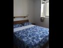 Апартаменты Dragi - at the beach & parking: A1(2+2), A2(2+1) Залив Каница (Рогозница) - Шибеник Ривьера  - Хорватия - Апартамент - A1(2+2): спальная комната