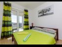 Апартаменты Anica A1(2+1), A2(2+2) Залив Каница (Рогозница) - Шибеник Ривьера  - Хорватия - Апартамент - A2(2+2): спальная комната