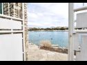 Апартаменты Ziva - by the beach; A1(6), A2(4), A3 (2+1) Залив Лозица (Рогозница) - Шибеник Ривьера  - Хорватия - дом