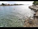 Апартаменты Ziva - by the beach; A1(6), A2(4), A3 (2+1) Залив Лозица (Рогозница) - Шибеник Ривьера  - Хорватия - пляж