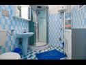 Апартаменты Modri Dragulj A1(2), A2(4), A3(4) Ражань - Шибеник Ривьера  - Апартамент - A1(2): ванная комната с туалетом