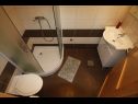 Апартаменты Deep Blue A1 PR(6+1), A2 KAT(6+1), A3(4+1) Срима - Шибеник Ривьера  - Апартамент - A2 KAT(6+1): ванная комната с туалетом